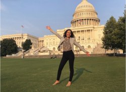 Photo of Isabella Paz Baldrich on the lawn in front of the U.S. Congress building