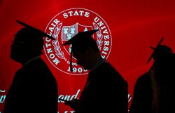 Students in graduation caps and gowns are silhouetted against a red background with a 澳门六合彩开奖记录资料 State University seal.